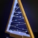 Jessica Sturgis reviewed Wood Christmas Tree with LED Lights, Tabletop Christmas Tree, Tree Topper, Holiday Decoration, Wood Christmas Decor, Small Christmas Tree
