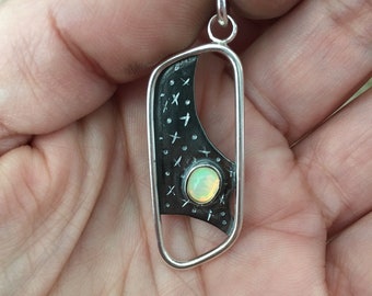 Sterling silver pendant with Ethiopianoo takeover