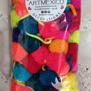 Vibrant Wall Hanging Nursery Room Decor Bedroom Boho Accessory Colorful Pompom Garland with tassels Mexican Decoration Handmade String Banner Three Pack Collection Five Feet Long Festive Bunting Bohemian Style Authentic Design Party Decoration