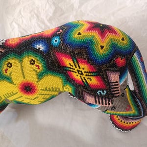 beaded jaguar sculpture close up