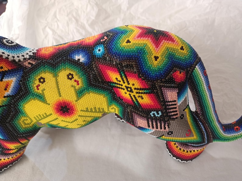 beaded jaguar sculpture close up
