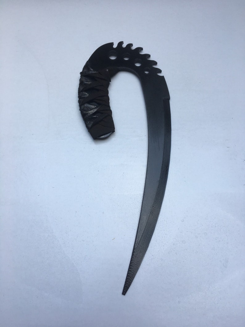 May include: A black, curved, serrated blade with a black leather wrapped handle.