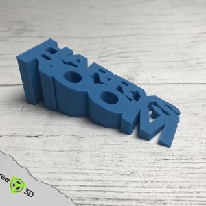 May include: A blue plastic doorstop shaped like the word "ROOM".