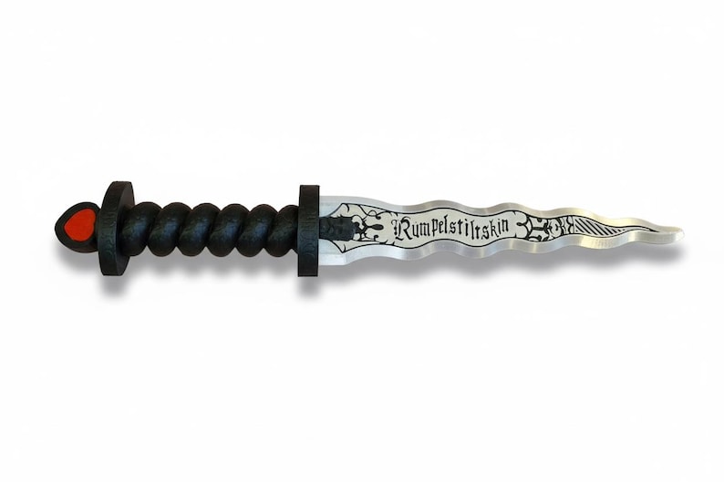 May include: A decorative dagger with a black handle and a silver blade. The handle has a twisted design, and the blade is inscribed with the word "Rumpelstiltskin". The pommel features a red accent.