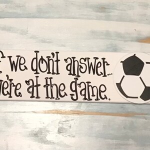 Soccer sign We&#39;re at the game