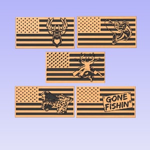 May include: Five wooden American flag signs with different designs. The designs include a deer, a fish, a hunter, a deer with a rifle, and the text "Gone Fishin'" on a sign.
