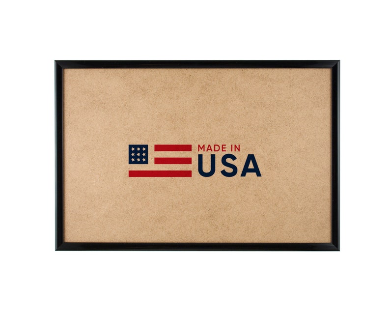 A black contemporary 16 x 20 inch picture frame with foil finish plastic moldings, no image, MDF backing, and with a MADE IN USA label
