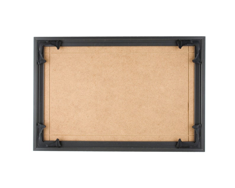 May include: A black picture frame with a brown mat. The frame has a simple design and is ready to display a photo or artwork.