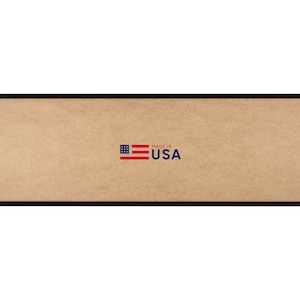May include: A black framed corkboard with the text "Made in USA" and a small American flag graphic.