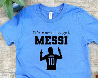 Kid's Tee, Shirts With Sayings, It's About To Get Messi, Soccer, Columbia Blue or Lavender, Unisex, Girls, Boys