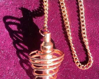 Copper-Closeout Copper-Beautiful handmade wire swirled around solid core center pointer about 9" long includes 6" chain Great Balance