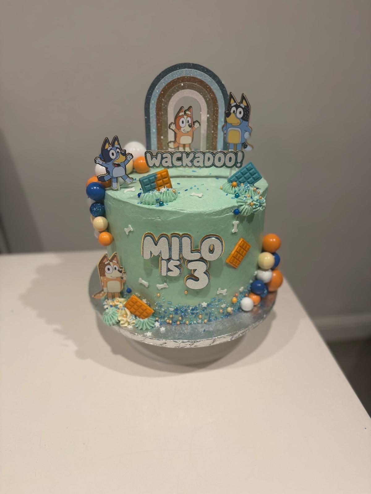 Blue dog rainbow topper