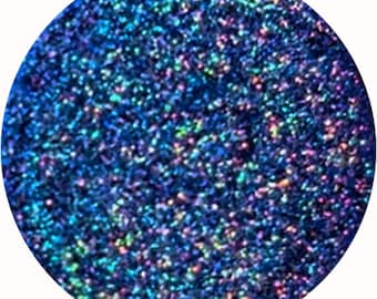 May include: A round jar of blue glitter with iridescent shimmer.