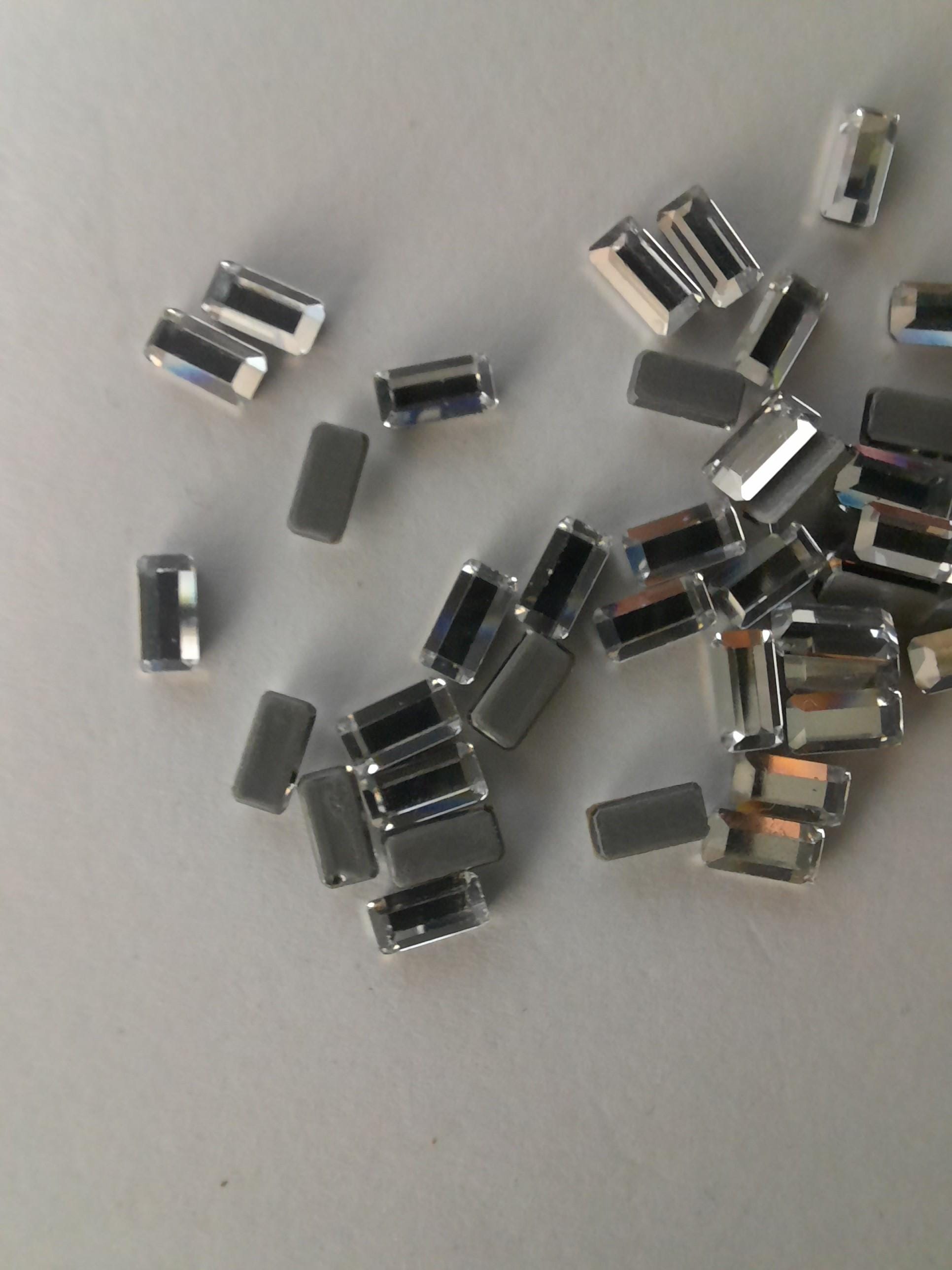 2510 Swarovski Crystal 5x2,5mm Flatback Baguette Hot Fix Rhinestones. Tiny NAIL Art Crystals. Sold in Packs of 12 & 36 Pcs.