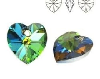 May include: Two crystal heart-shaped pendants, one green and blue with a faceted design, the other a darker blue with a more rounded shape.