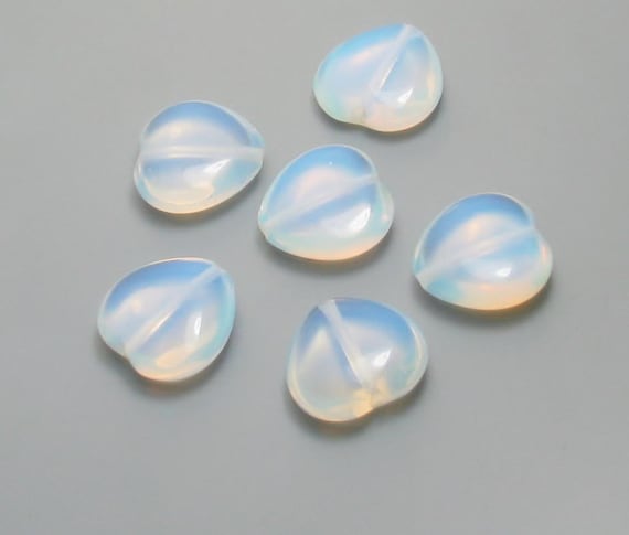 Opalite Moonstone Heart beads Available in 20mm & 18mm. Sold in Packs of 6 Pieces.