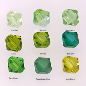 May include: Nine different shades of green glass beads, including Chrysolite, Peridot, Peridot AB, Khaki, Olivine, Emerald, Fern Green, Palace Green Opal, and Lime Green.