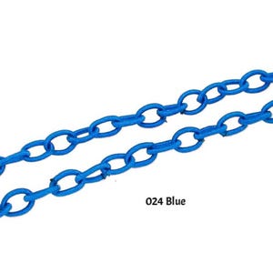 May include: A close-up of a blue chain made of fabric. The chain is made of oval links and is about 1/2 inch wide. The chain is shown in two rows, with the top row slightly offset from the bottom row. The text "024 Blue" is visible in the lower right corner of the image.