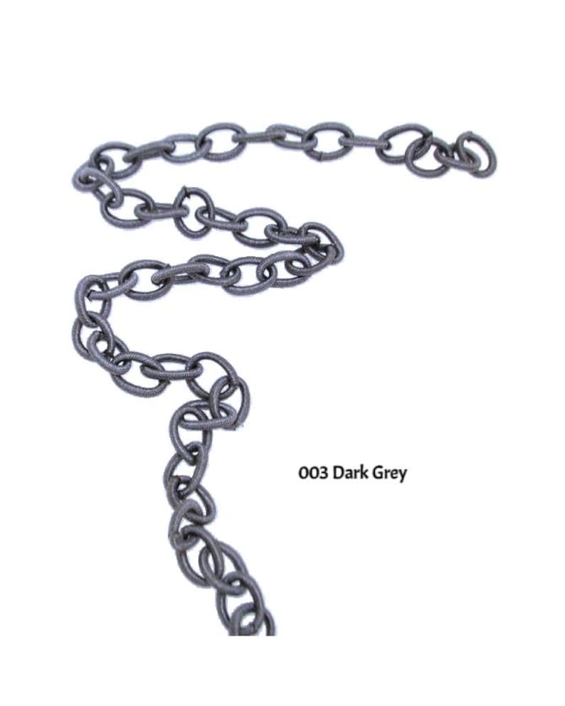 May include: A dark gray chain made of metal links. The chain is about 18 inches long and is perfect for adding a touch of industrial style to your home decor.