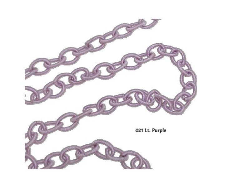 May include: A light purple chain made of fabric. The chain is looped and twisted, showing the texture of the fabric. The text "021 Lt. Purple" is visible in the image.