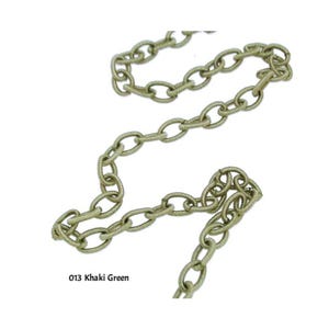 May include: A close-up of a khaki green chain made of woven fabric. The chain is looped and draped on a white background. The text "013 Khaki Green" is visible in the lower left corner of the image.
