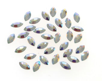 Swarovski 2200 8x4mm Navette Crystal AB Flatbacks, Hotfix - Crystal AB, Genuine SWAROVSKI Elements. Sold per pkg of 6, 12  or 24pcs.