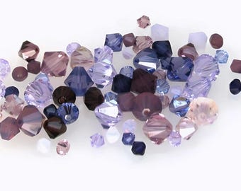 Swarovski 5301 / 5328 Bicone-kralen in paarse tinten. Maten 4, 6, 8 en 10 mm. Verkocht in verpakkingen van 6 en 12 kralen.
