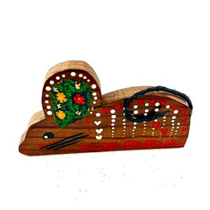 May include: Wooden mouse figurine with painted details. The mouse is brown with a green and floral design on the ear. The body is decorated with white dots and red hearts. A black string forms the tail.