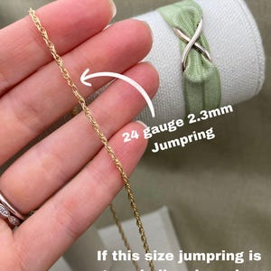 May include: Close-up of a gold chain with a 24 gauge 2.3mm jump ring. The text "If this size jumpring is too challenging, size up to 24 gauge 2.8mm" is visible below the chain.