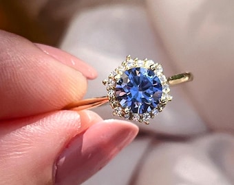 Anel com halo de tanzanita, anel vintage com halo hexagonal e uma tanzanita roxa profunda em prata e ouro.