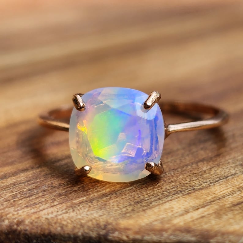 ring, rainbow iridescent fire welo opal, square stone, silver, yellow gold, rose gold