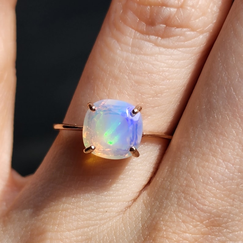 ring, rainbow iridescent fire welo opal, square stone, silver, yellow gold, rose gold