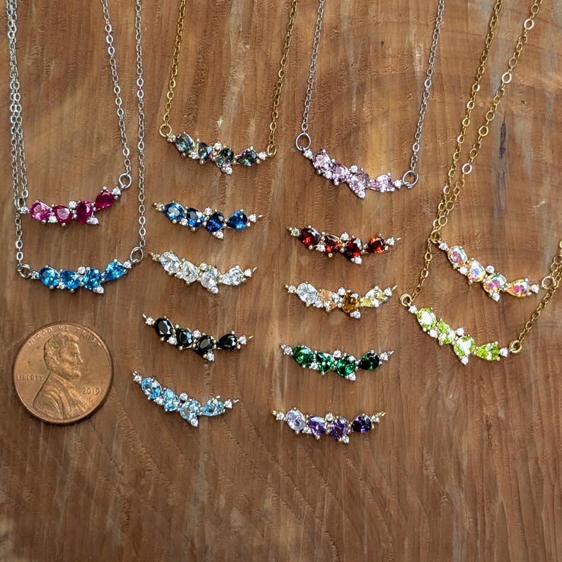 aquamarine legacy four stone cluster necklace, custom, light blue, teardrop and oval, silver, yellow gold