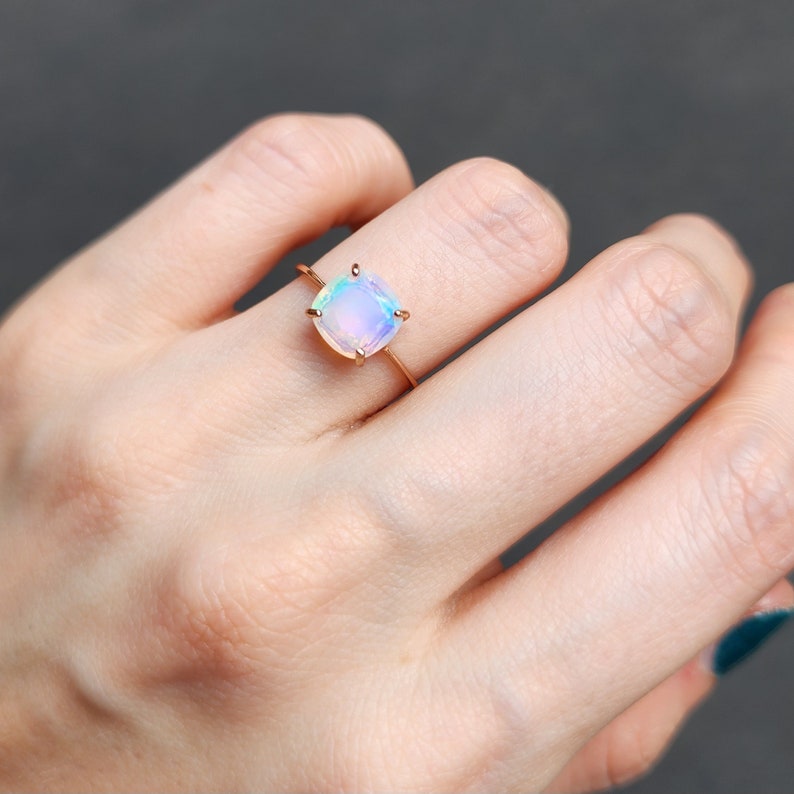ring, rainbow iridescent fire welo opal, square stone, silver, yellow gold, rose gold