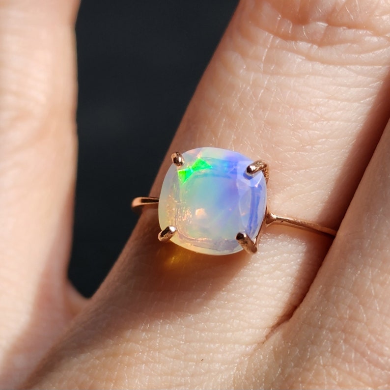 ring, rainbow iridescent fire welo opal, square stone, silver, yellow gold, rose gold