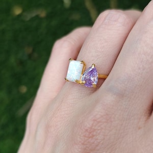 ring, aurora, toi et moi, custom, two stone, emerald cut and teardrop, genuine gemstone red garnet, purple amethyst, light blue aquamarine, clear quartz, opal, green emerald, multicolor alexandrite, rainbow topaz, pink ruby, light green peridot, blue sapphire, pink tourmaline, orange citrine, blue-purple tanzanite, sunstone, smokey quartz, onyx, moss agate, rutilated quartz, in silver yellow gold rose gold 14k solid gold