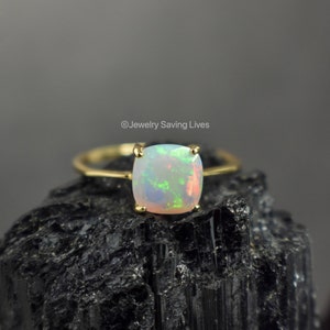 ring, rainbow iridescent fire welo opal, square stone, silver, yellow gold, rose gold