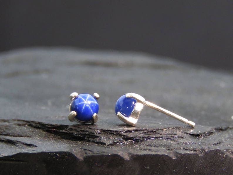 round sapphire earrings in silver