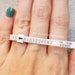 Plastic ring sizer, ring sizer chart, reusable ring sizer, ring sizer, adjustable ring sizer, plastic ring size finder 