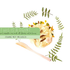 May include: A print of a floral arrangement made with dried flowers and leaves. The print is surrounded by green fern leaves. The text "THIS IS A PRINT" is at the top of the image. The text "the original composition was made with flowers and/or leaves" is below the first line of text. The text "-FRAME NOT INCLUDED-" is at the bottom of the image.