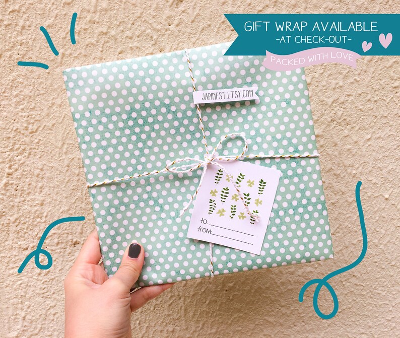 May include: A green and white polka dot gift wrap with a white gift tag that says "to... from..." and has a floral design. The gift is tied with twine and a small tag that says "japanestet.etsy.com". The text "Gift Wrap Available - At Check-Out - Packed With Love" is at the top of the image.