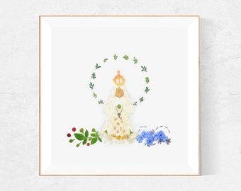 May include: A white floral arrangement depicting a religious figure wearing a crown and a white robe. The figure is surrounded by a wreath of green leaves and there are red berries and blue flowers on either side.