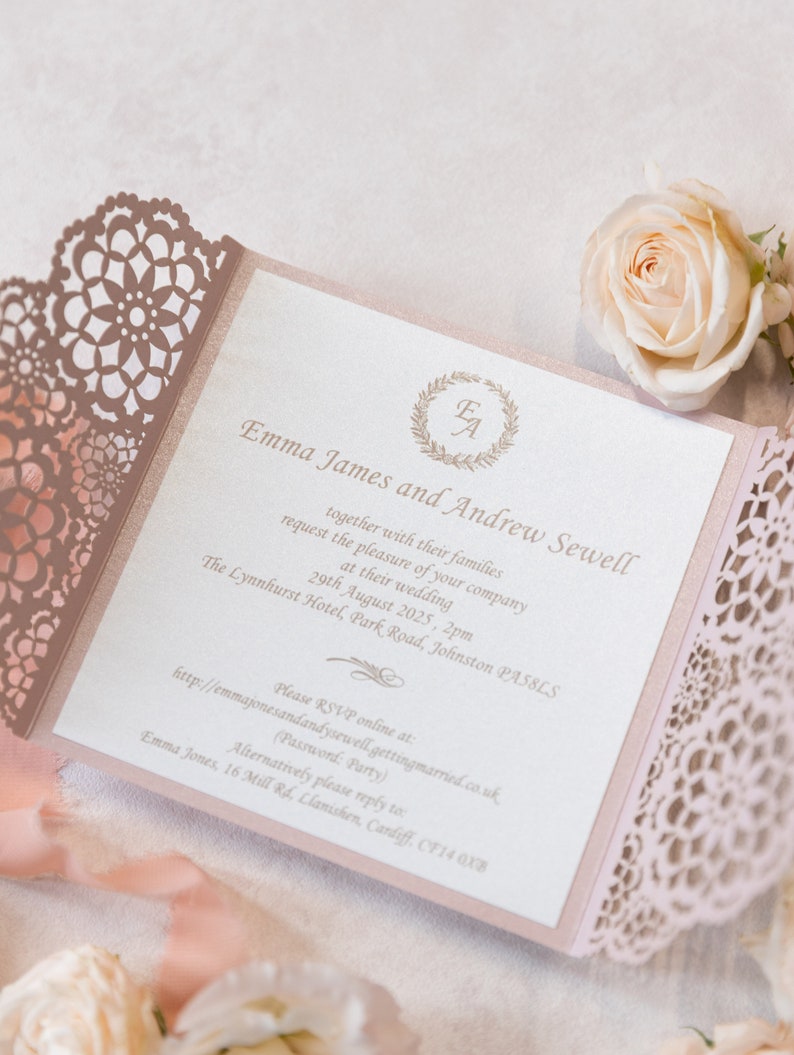 May include: A pink and white wedding invitation with a lace design. The invitation reads "Emma James and Andrew Sewell request the pleasure of your company at their wedding 29th August 2025, 2pm The Lynnhurst Hotel, Park Road, Johnston PAS8LS Please RSVP online at: http://emmajonesandandysewell-gettingmarried.co.uk (Password: Party) Alternatively please reply to Emma Jones, 16 Mill Rd, Clanishen, Cardiff, CF14 QXB"