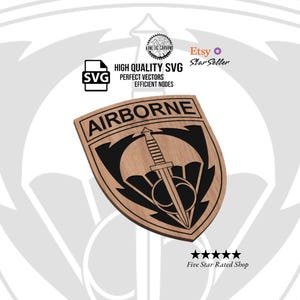 May include: Wooden plaque with the word "AIRBORNE" at the top. Below is a black graphic of a parachute, a dagger, and a shield. The plaque has a light brown wood grain finish. The image also includes the text "HIGH QUALITY SVG PERFECT VECTORS EFFICIENT NODES".