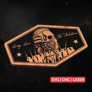 May include: Wooden plaque with a black centre and a light brown border. The plaque features a skull wearing a bandana, a line of soldiers, stars, and the words "Long Live" and "The Rebellion". The year "1776" is also displayed.