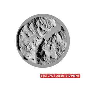 May include: A circular grey relief map featuring a detailed topographical landscape with a central river or canyon divide. The text "STL | CNC | LASER | 3-D PRINT" is printed in white on a red rectangular background at the bottom of the image.