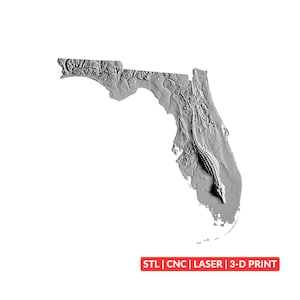 May include: A grey, three-dimensional relief map of the state of Florida featuring a textured surface and a sculpted alligator figure positioned along the peninsula. The text STL | CNC | LASER | 3-D PRINT appears in a red rectangular box below.
