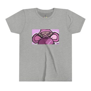May include: A heather gray t-shirt featuring a cartoon graphic of a person in a hooded sweatshirt. The graphic is in shades of pink and purple, with the artist's signature "tkjo" in the bottom right corner. The shirt has a crew neck and short sleeves.