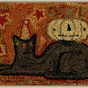 May include: A black cat with a pumpkin on its back, sitting on a brown and orange background with red stars.