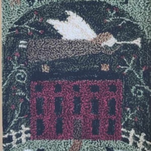 May include: A primitive style needlepoint design with the text "Everyday Blessings" at the top. The design features a red house with a white angel flying above it. There are also sheep in the green grass.